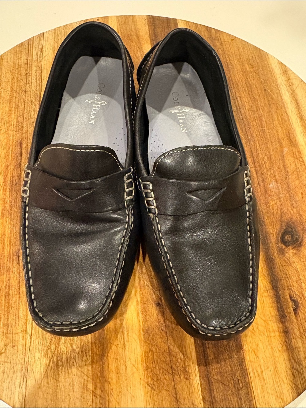 Cole Haan Black Leather Penny Loafers with Contrast Stitching